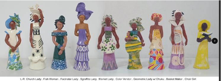 a group of statues of women
