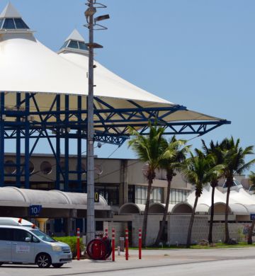 a white tent on the side of a road