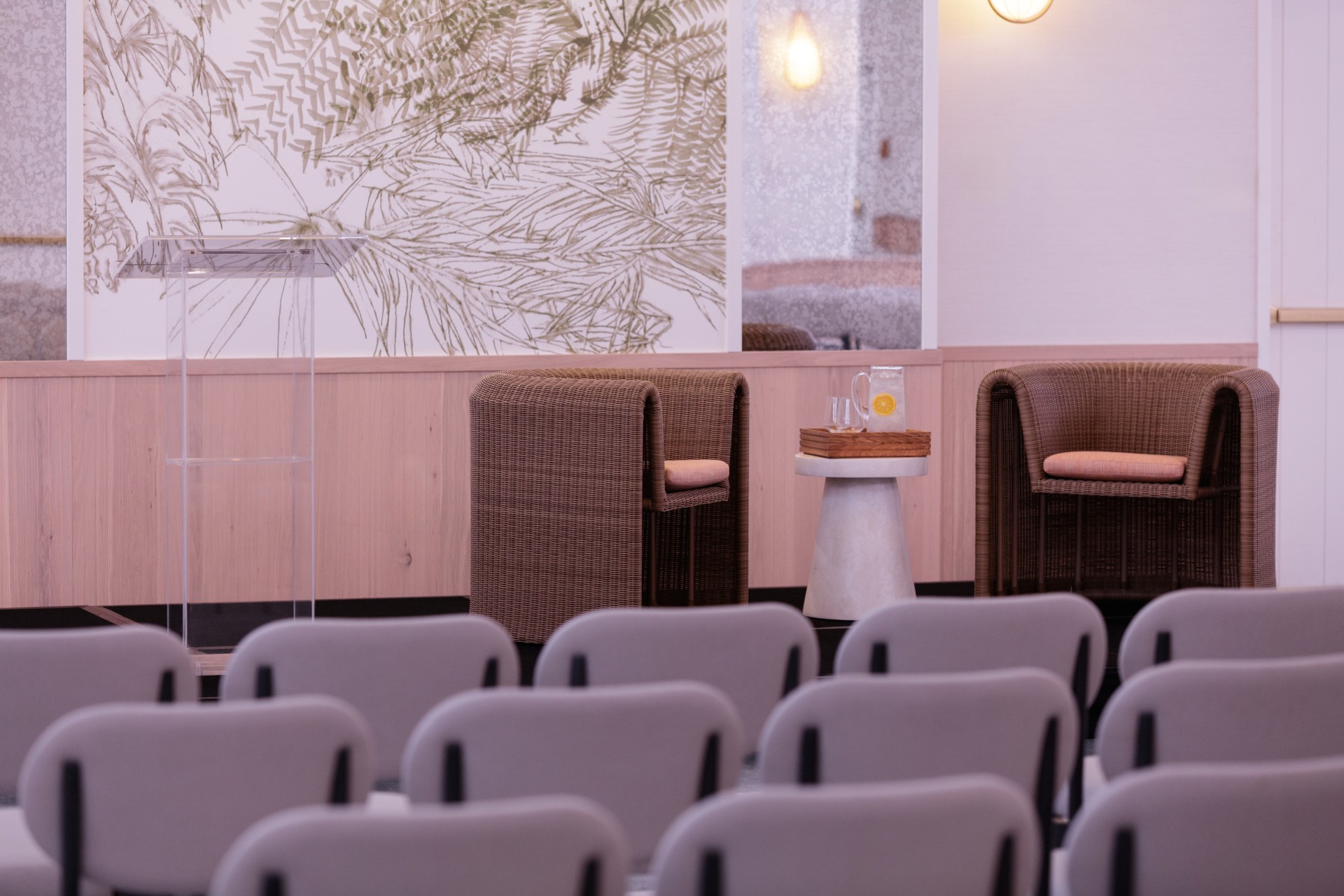 a room with chairs and a podium