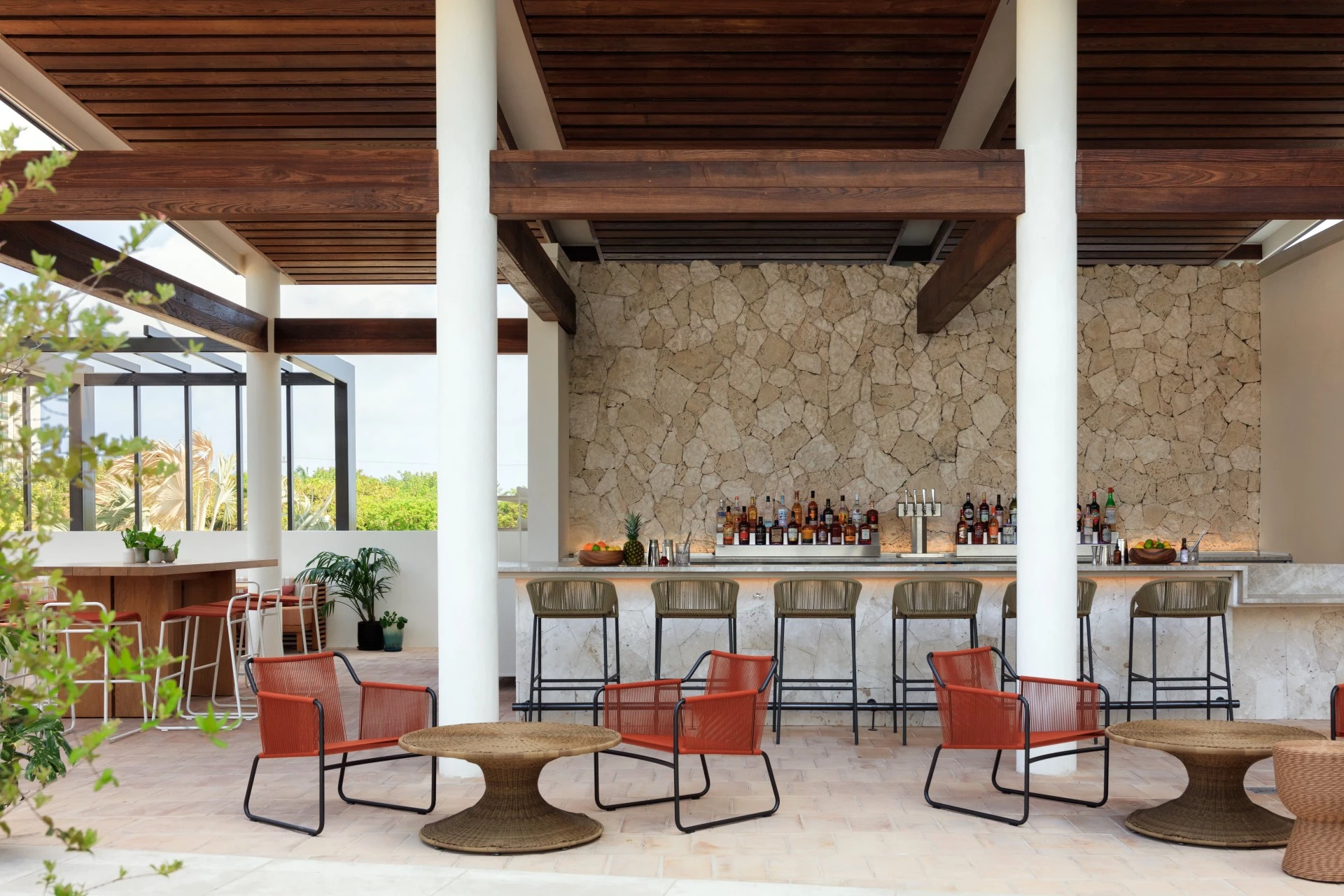 a bar with chairs and tables