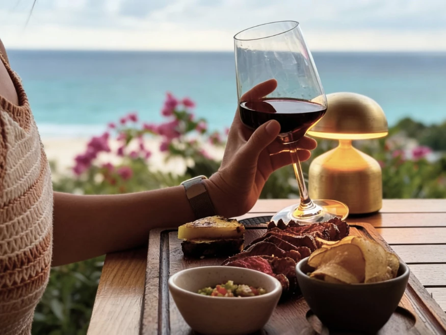 a person holding a glass of wine