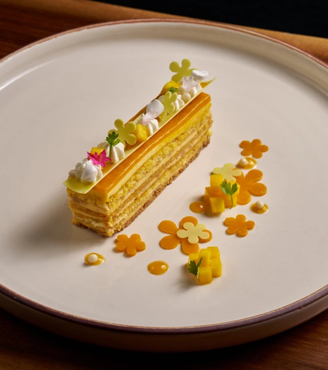 a piece of cake with flowers on top