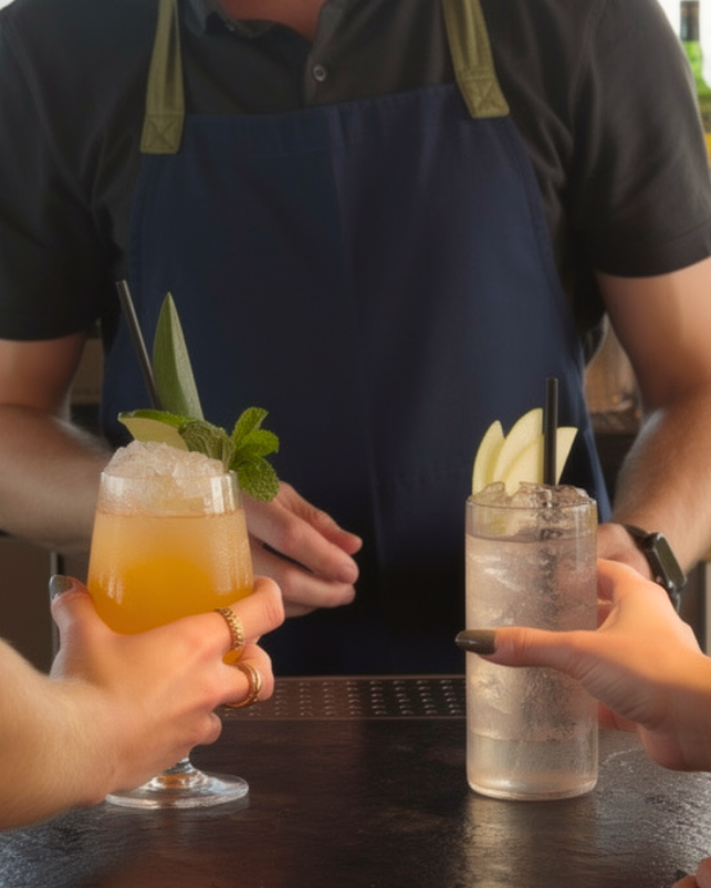 a group of people holding drinks
