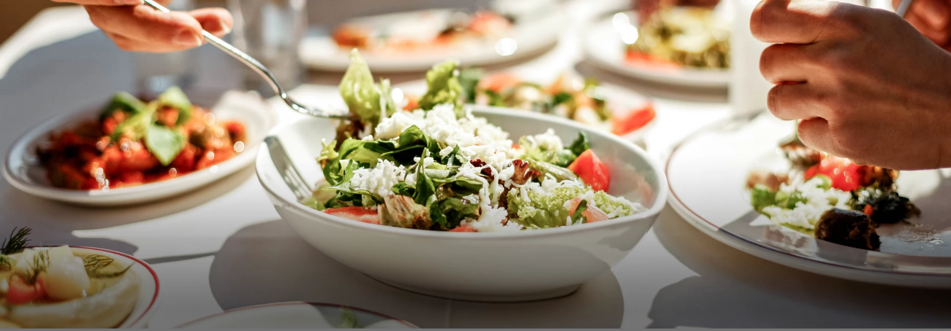 a bowl of salad with a fork