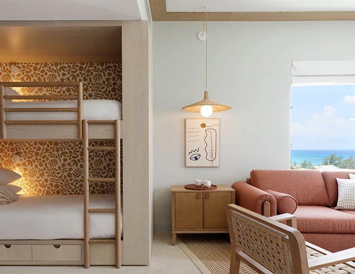 a room with a bunk bed and a couch