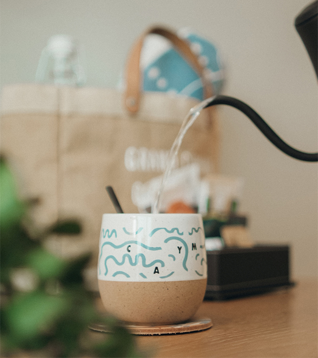 a water pouring into a cup