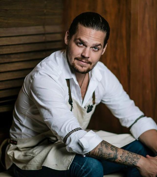 a man sitting on a bench