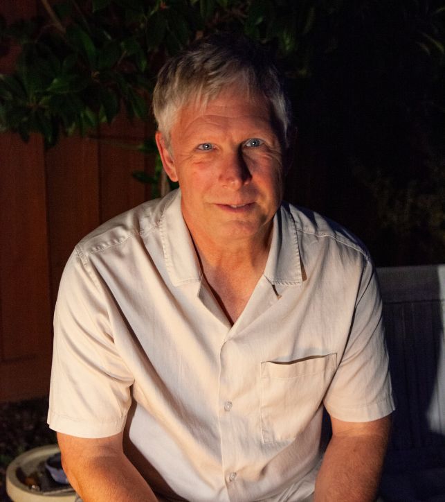 a man sitting on a bench