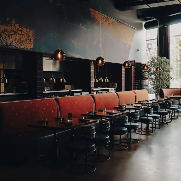 a long booth seating in a restaurant