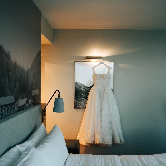 a wedding dress on a wall