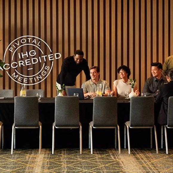 a group of people around a table