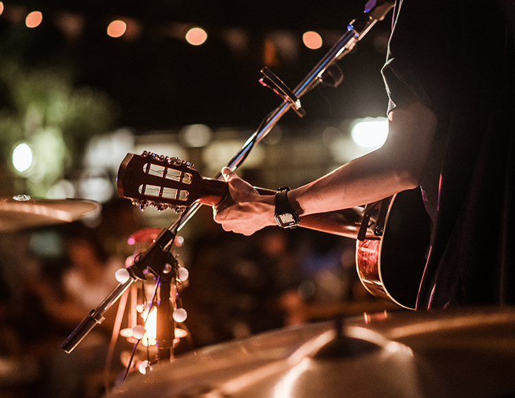 a person playing a guitar