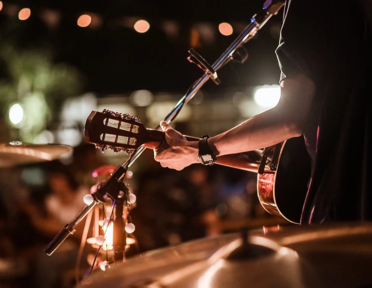 a person playing a guitar