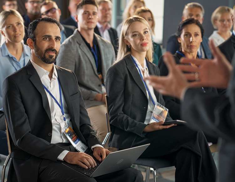 a group of people sitting in chairs