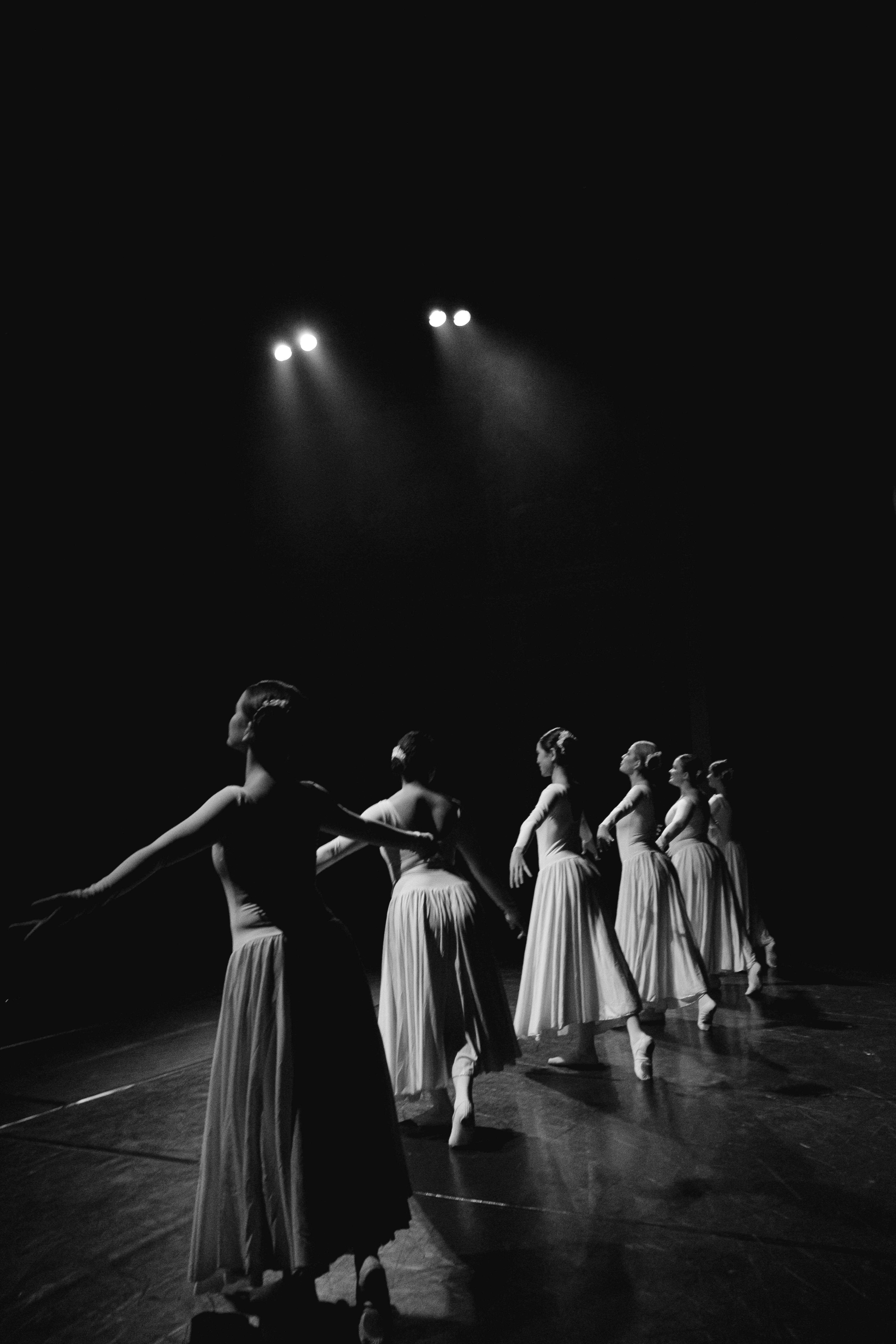 a group of women dancing on a stage