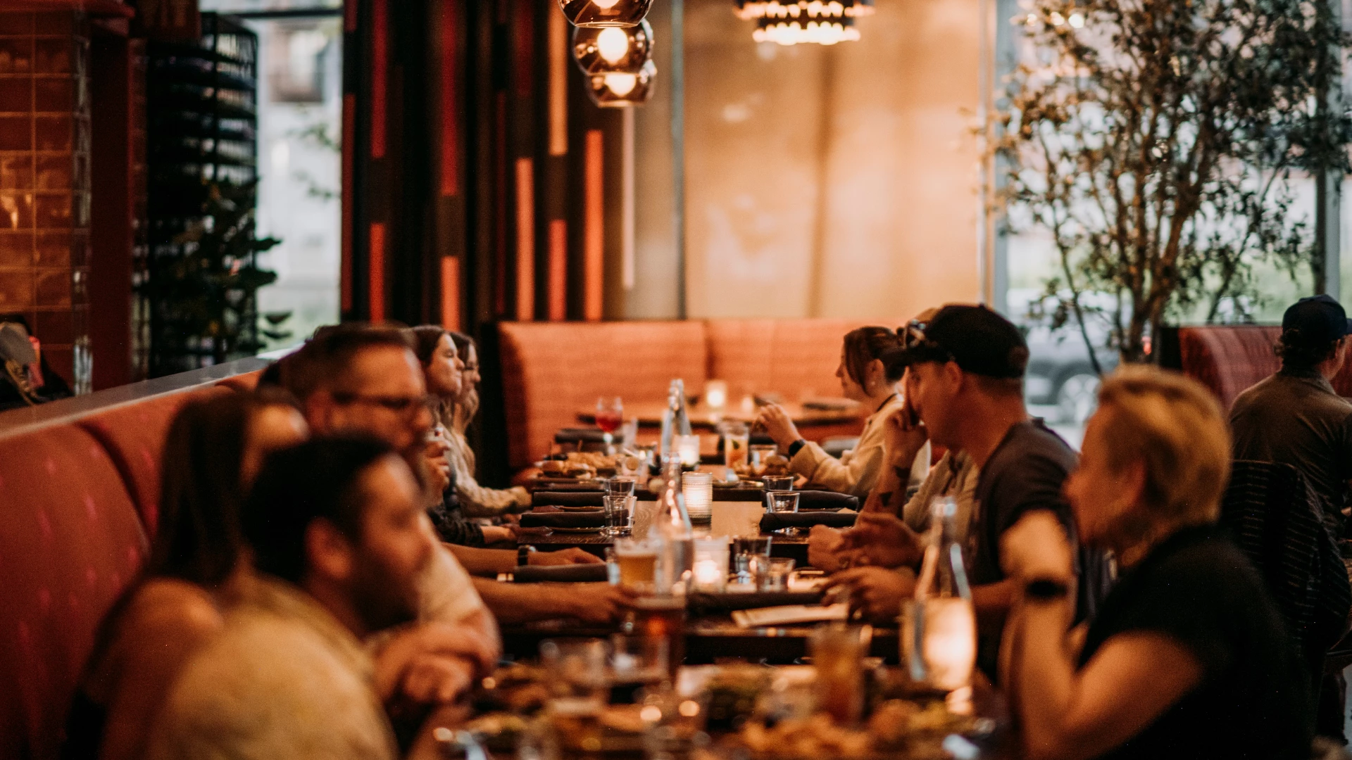a group of people sitting at a table