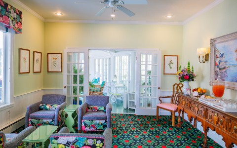 a room with chairs and a table