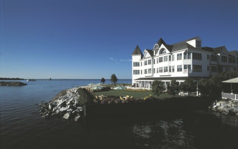 exterior of hotel next to the ocean