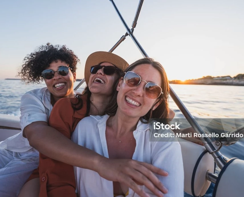 a group of women on a boat