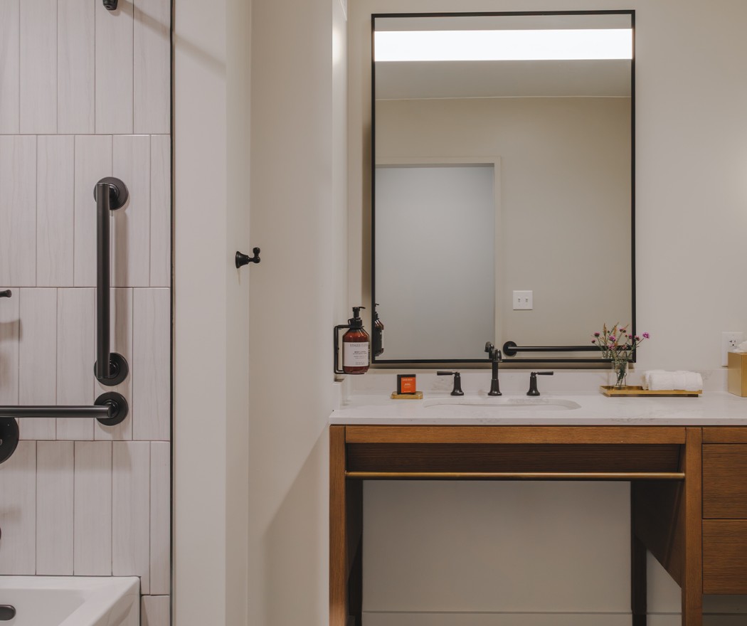 a bathroom with a sink and a mirror