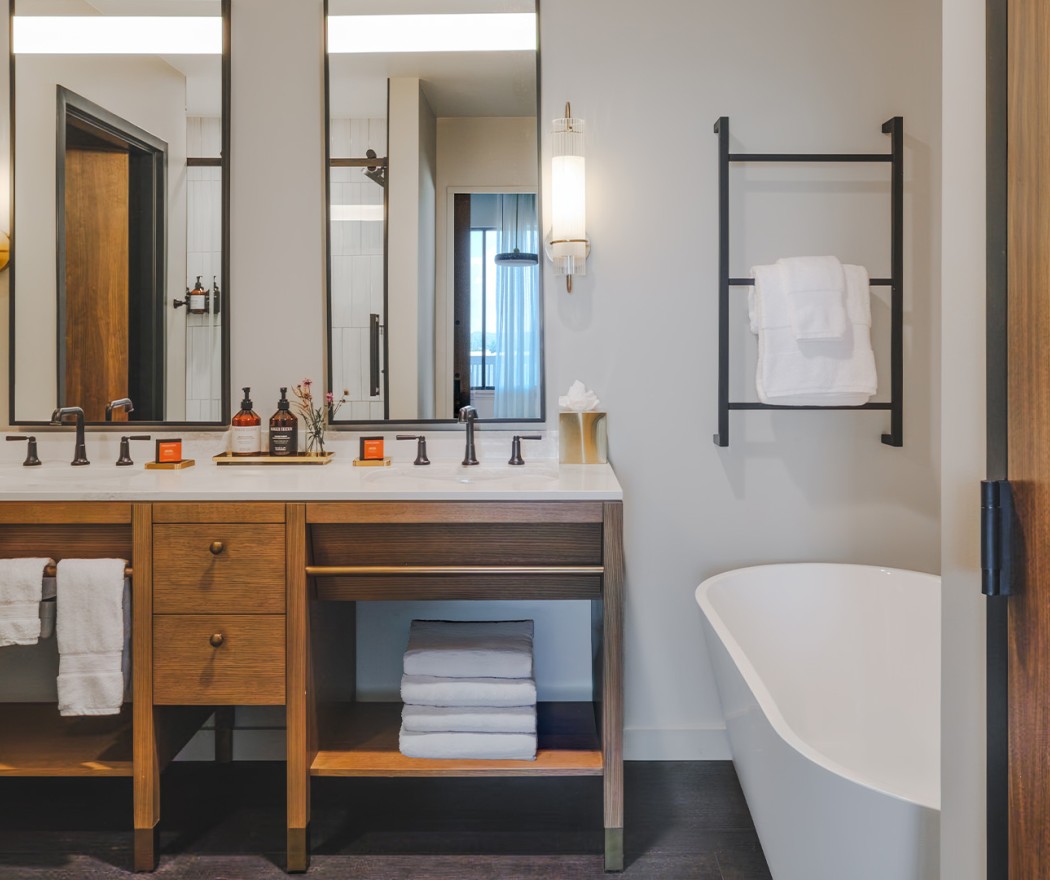 a bathroom with a bathtub and a sink
