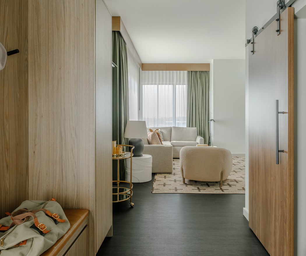 a room with a couch and a door