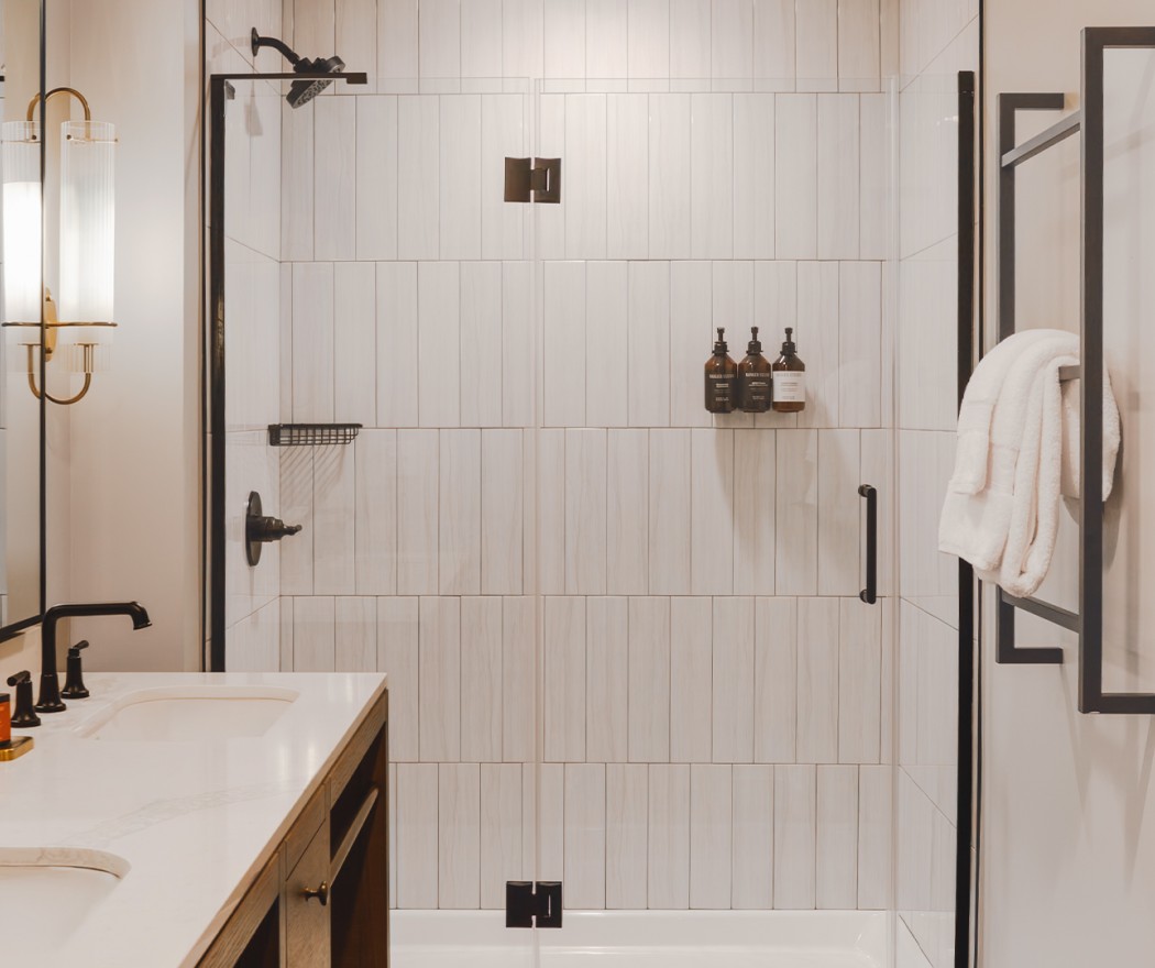 a bathroom with a shower and sink