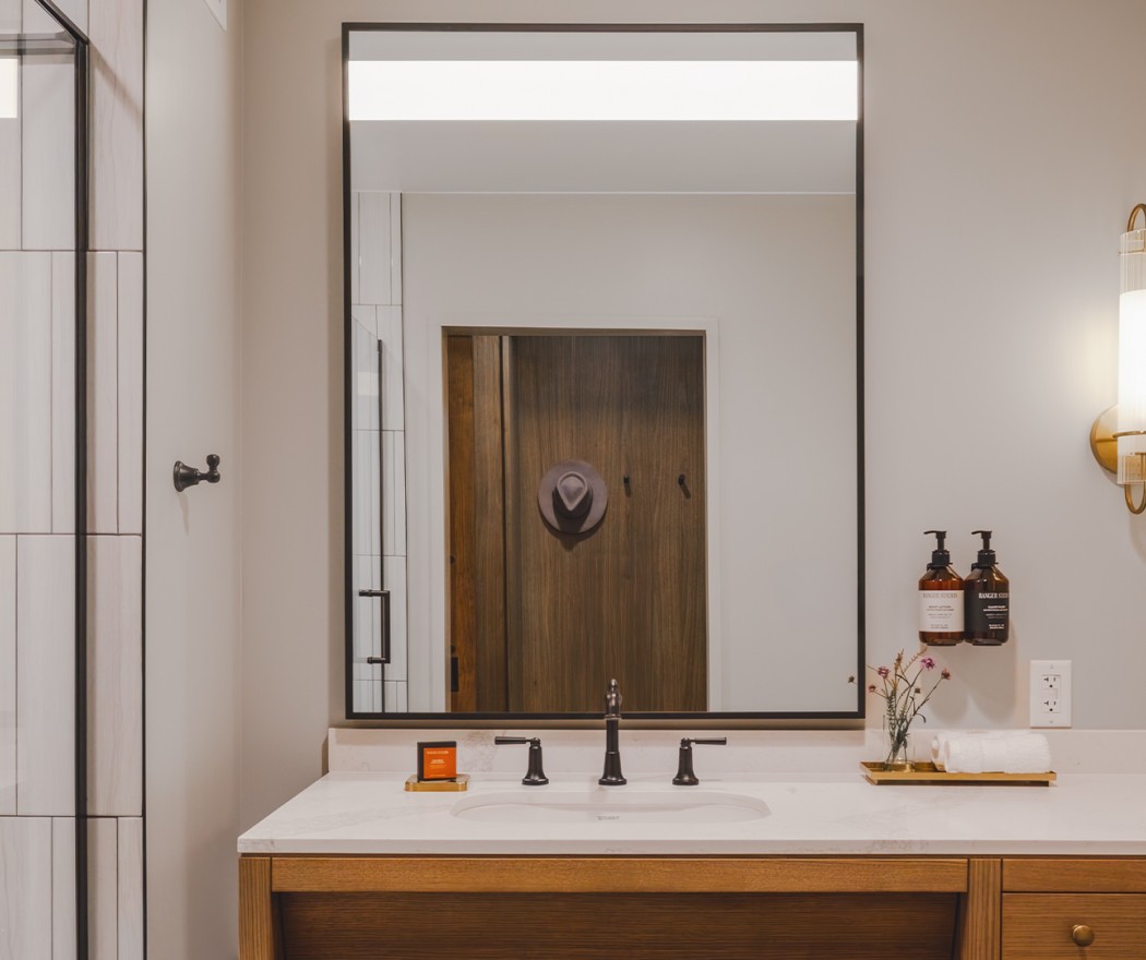 a bathroom with a mirror