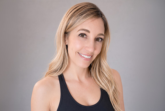 a woman smiling at camera