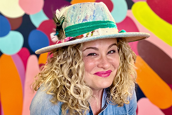 a woman smiling for the camera