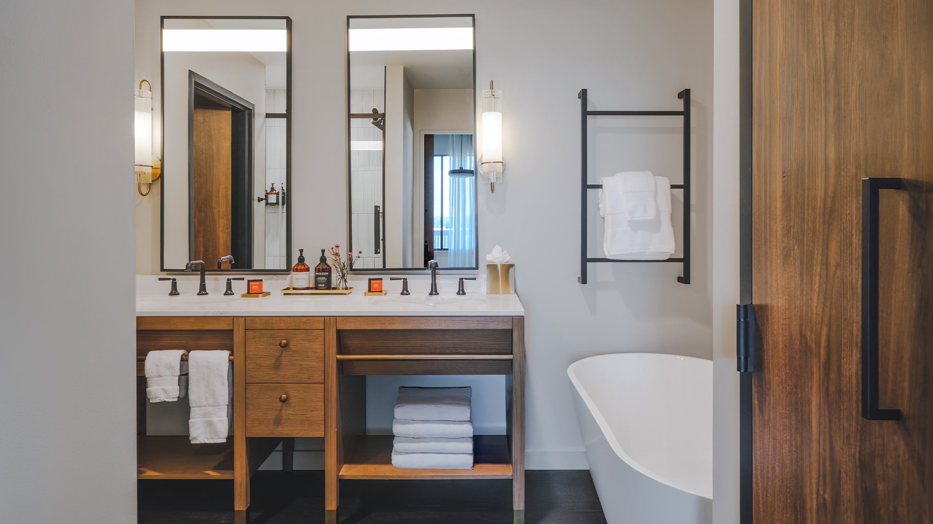a bathroom with a tub and a sink
