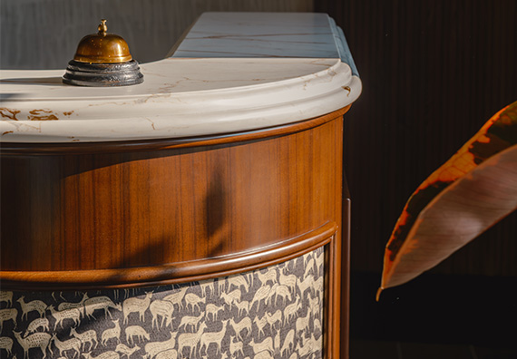a reception desk with a bell