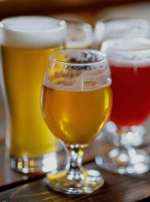 a group of glasses of beer