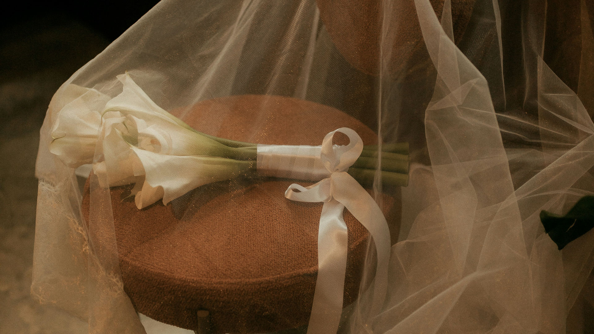 a bouquet of flowers on a stool