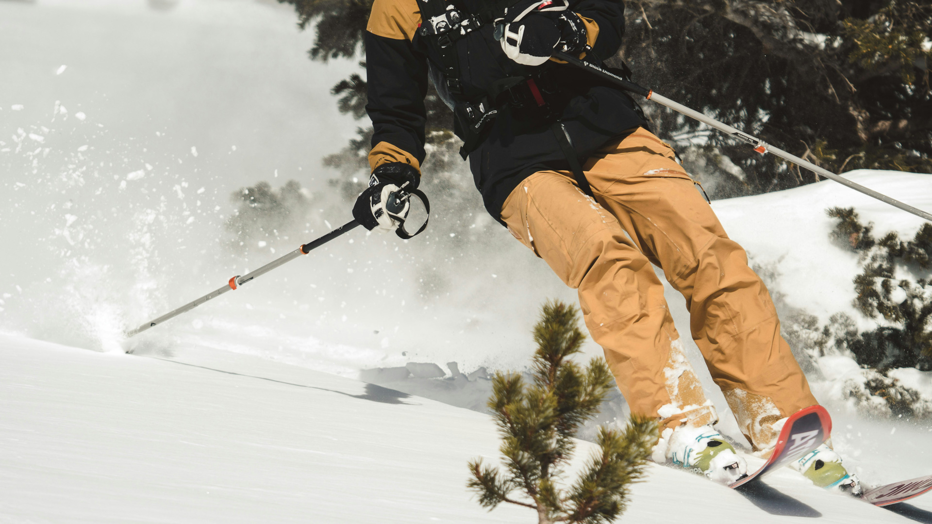 a person skiing down a snowy hill