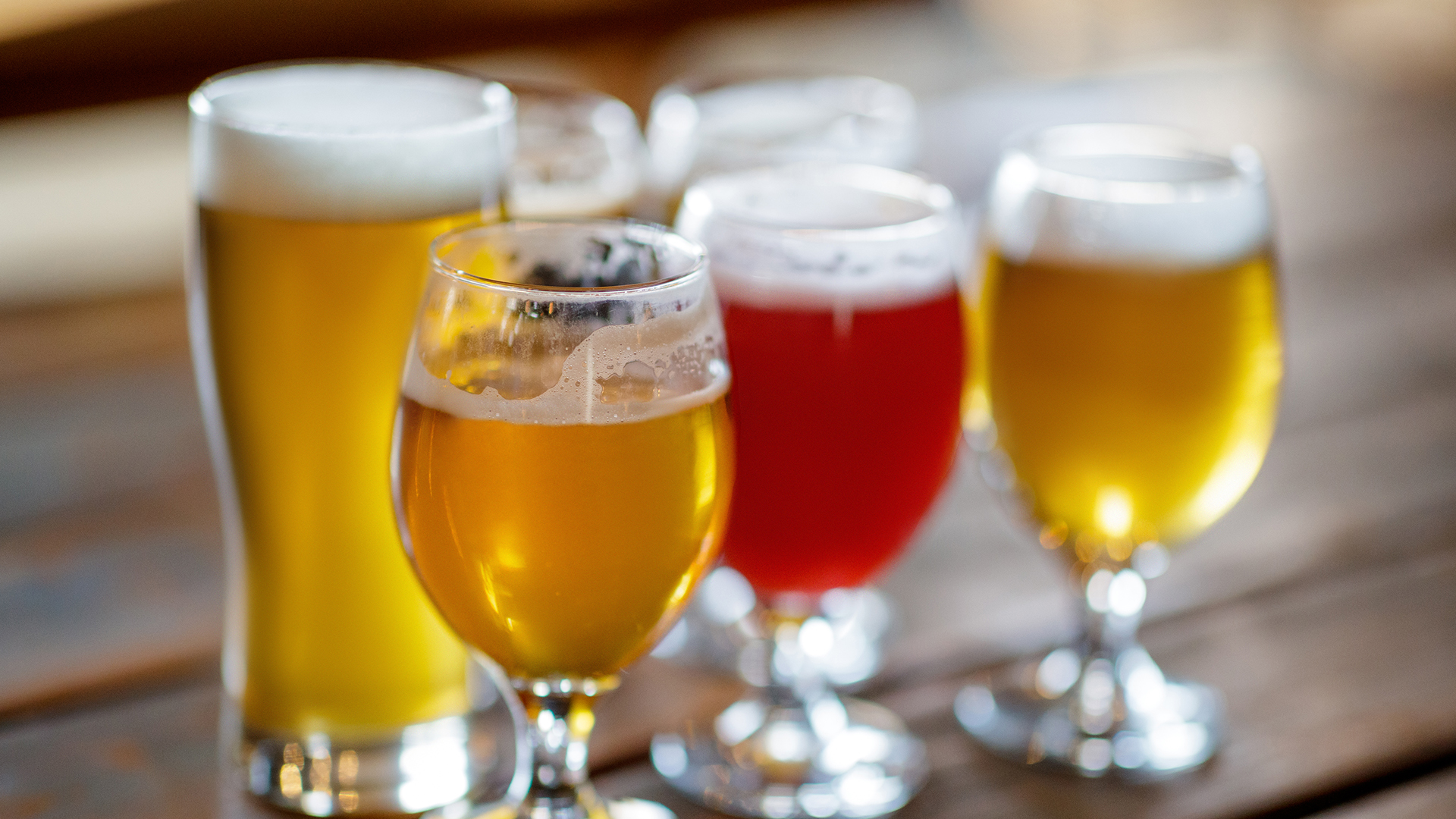 a group of glasses of beer