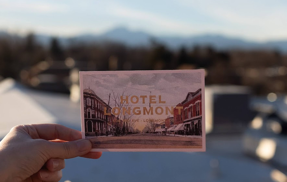 a hand holding a card