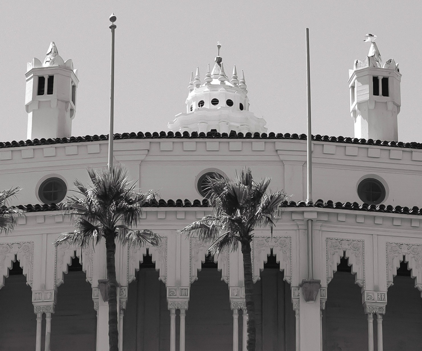 a building with palm trees