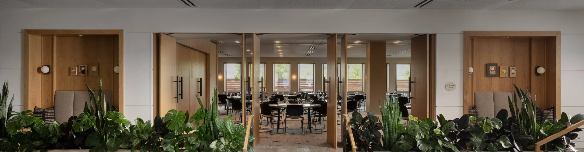 a room with tables and chairs