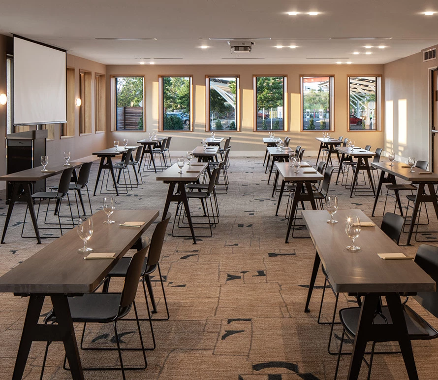 a room with tables and chairs