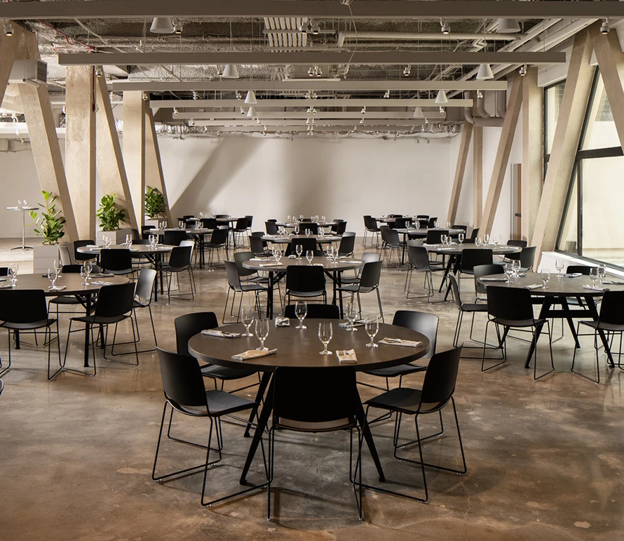 a room with tables and chairs