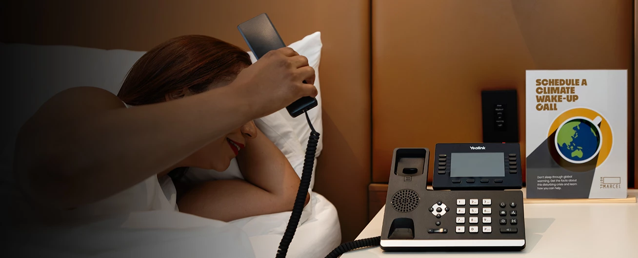 a woman holding a phone to her face