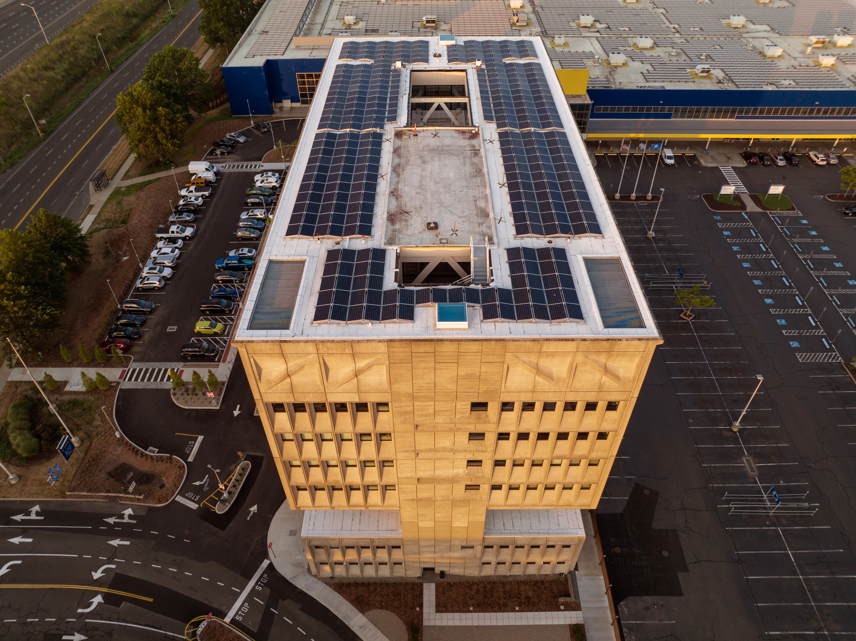 a building with solar panels on top