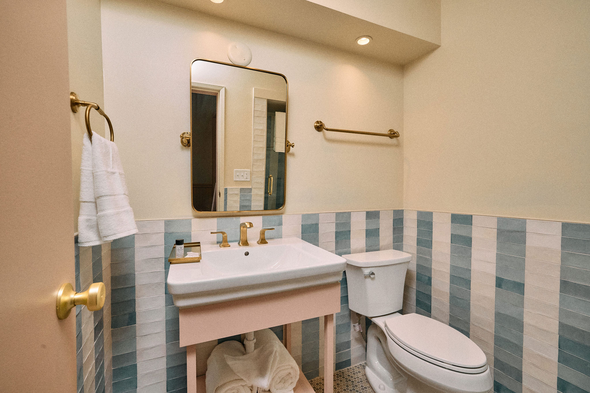 a bathroom with a sink and mirror