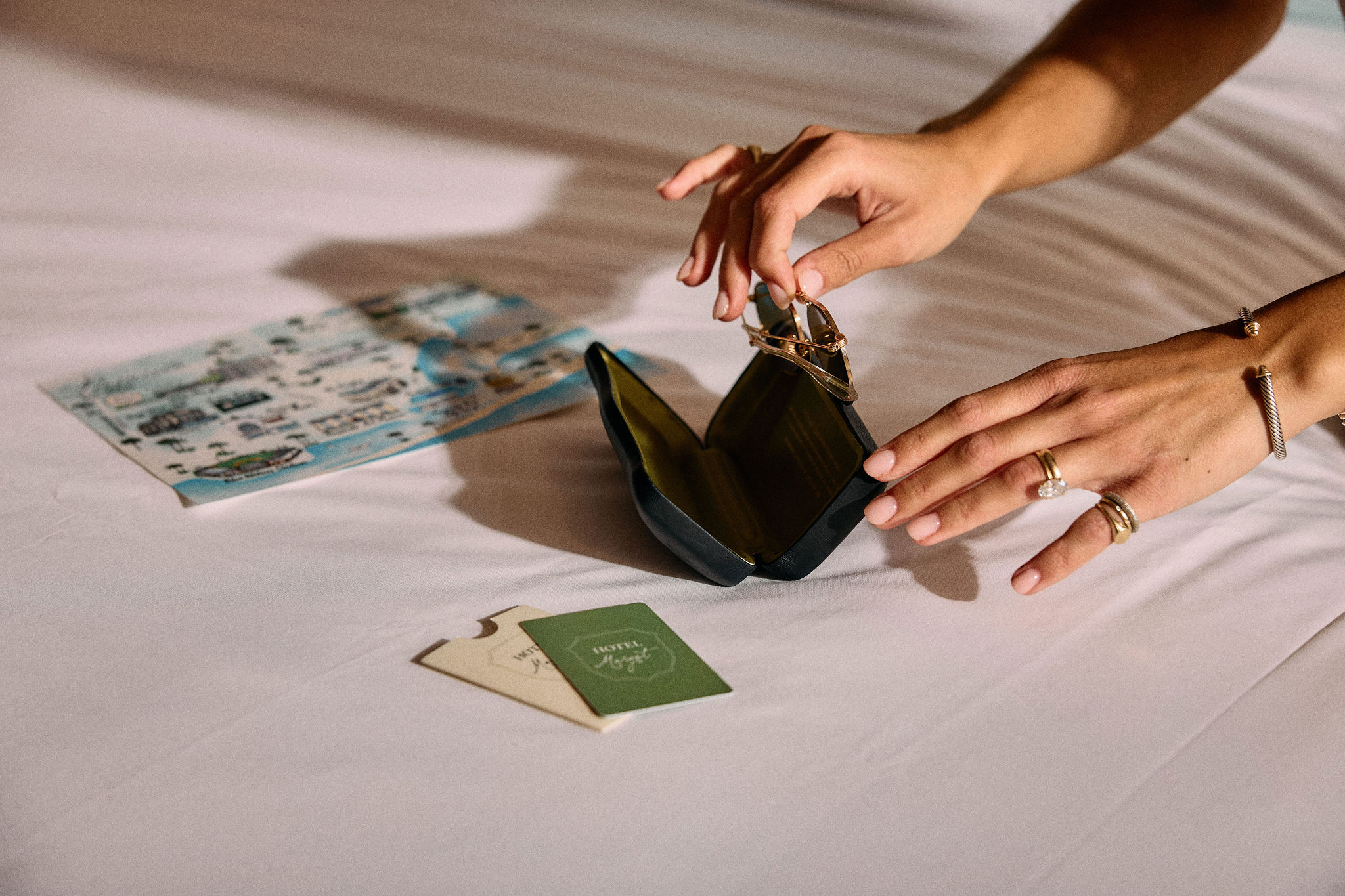 a person putting a ring into a wallet