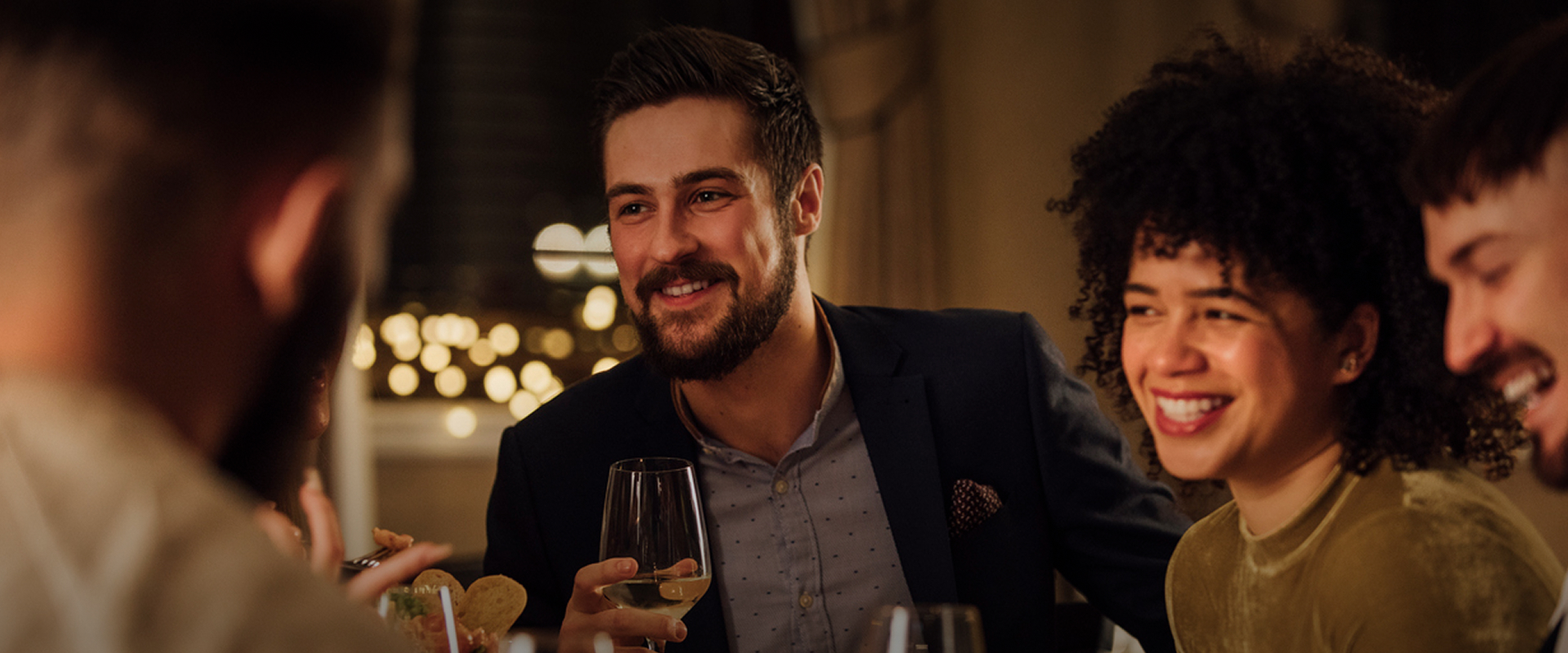 a man holding a wine glass