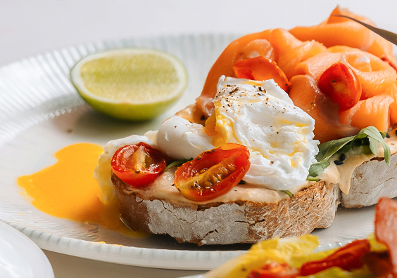 a plate of food on a white surface