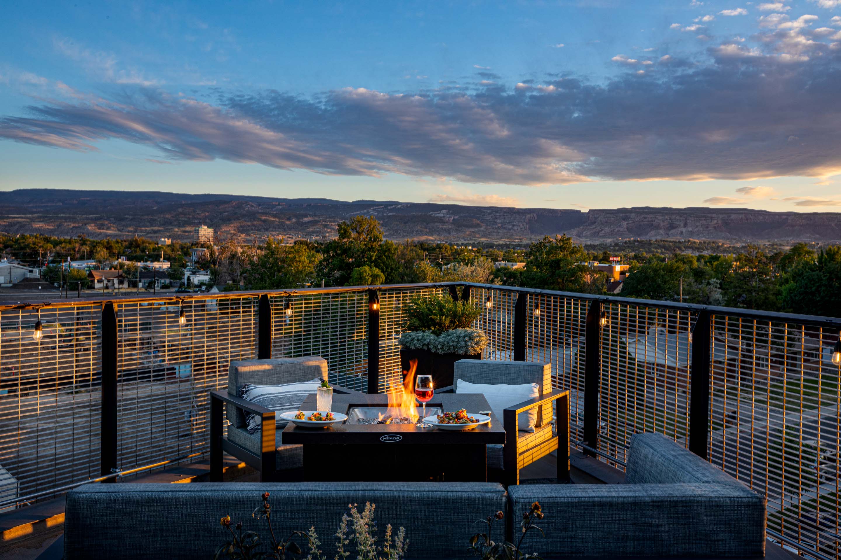 a fire pit on a balcony