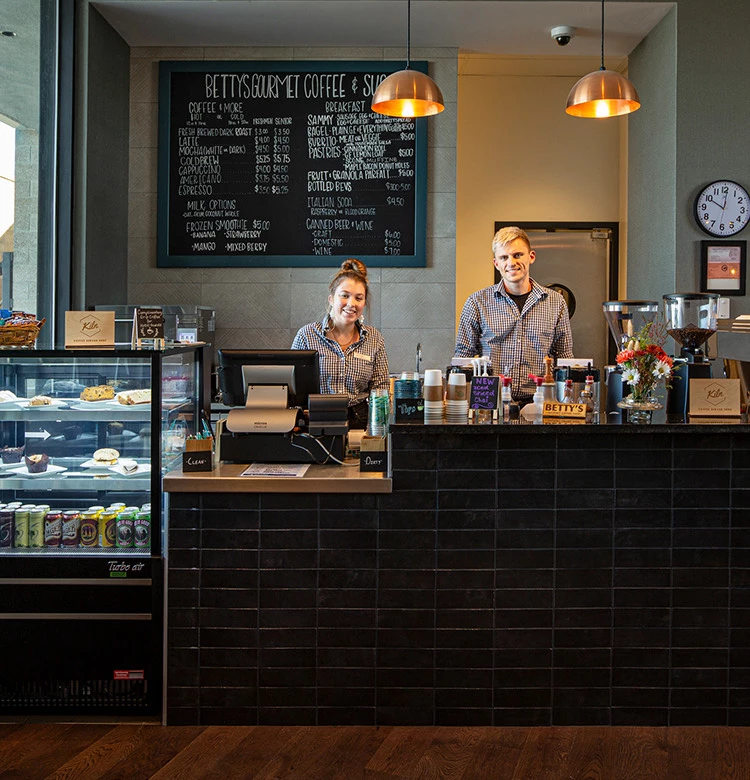 employees behind counter at Betty's Cafe