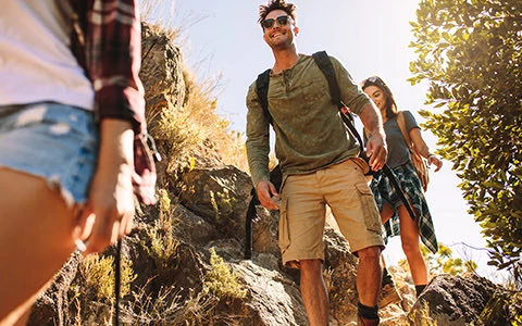 three people hiking